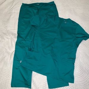 Eon brand scrubs in a green color.